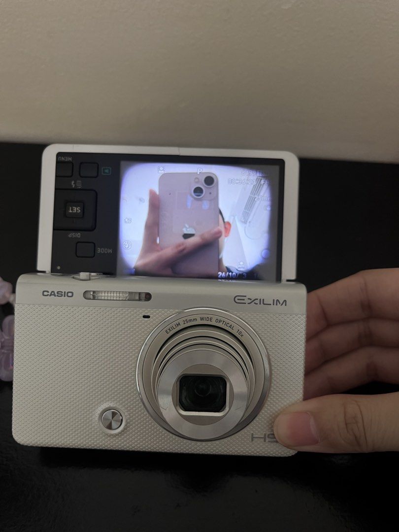 Casio Exilim EX-ZR55 (Category: Cameras) located in Manila. Submitted by lili.lilanne (Listing ID 1466000118, Image 3). Description: ˚୨✧୧⋆｡˚ Casio Exilim Ex-ZR55˚୨✧୧⋆｡˚ ⋆. 𐙚 ̊Price: 10,500 (slightly nego) 𝑭𝒆𝒂𝒕𝒖𝒓𝒆𝒔 16.1 MP Rotatable screen 𝒅𝒆𝒕𝒂𝒊𝒍𝒔 All functions working- Flash, zoom and buttons Body cosmetics- 8/10 𝑰𝒔𝒔𝒖𝒆 Black LCD vignette (doesn’t affect outputs), body scratches (minimal) & no port cover. 𝑰𝒏𝒄𝒍𝒖𝒔𝒊𝒐𝒏𝒔 