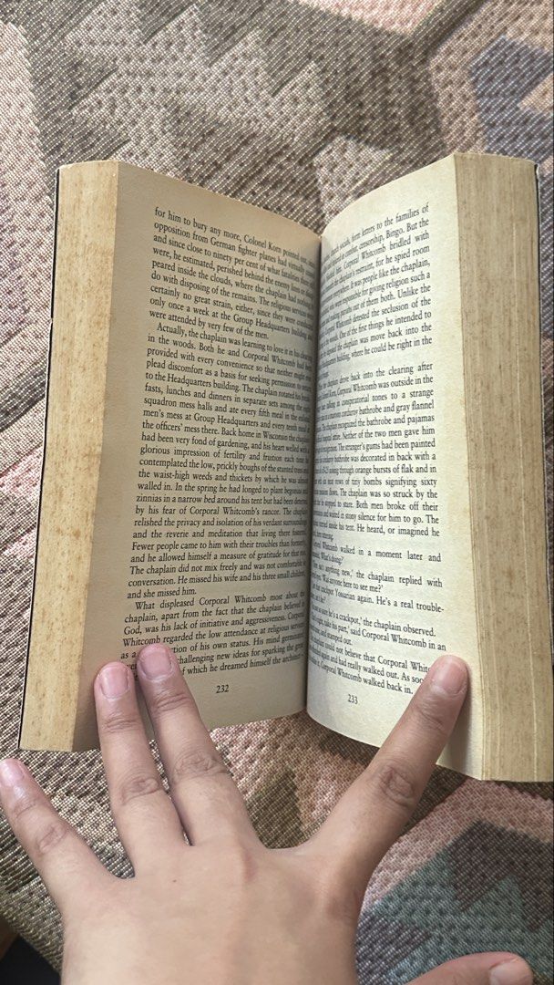 Catch-22 by Joseph Heller 50th Anniversary Edition (Category: Storybooks) located in Manila. Submitted by goldschlagered (Listing ID 1465962905, Image 3). Description: - Title: Catch-22 by Joseph Heller - Edition: 50th Anniversary Vintage Edition (Paperback) - ISBN: 978-0-099-52912-5 - Condition: Pre-loved with vintage charm. Pages have natural yellowing from age; cover has light edge wear - Binding: Solid and intact, perfect for reading. Price n