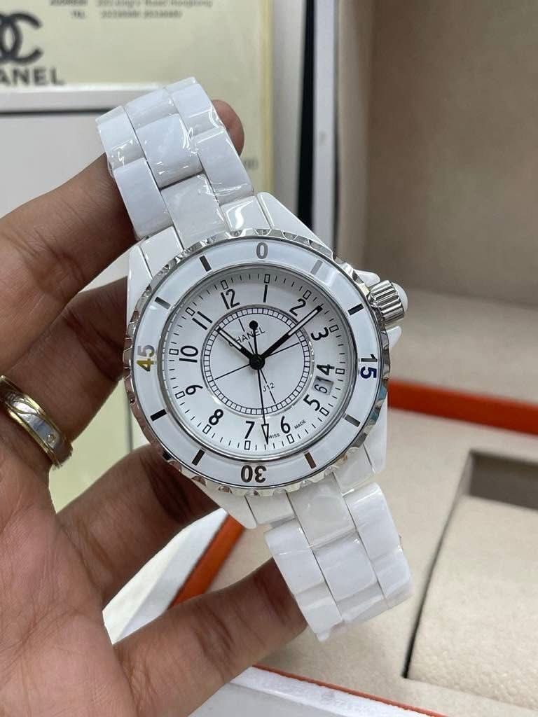 CC J12 White Ceramic Watch (Category: Luxury Watches) located in Manila. Submitted by bagsandmanymanymore1 (Listing ID 1465964010, Image 1). Description: - Brand: CC Watch J12 -Size 40mm - Material: High-tech white ceramic with stainless steel deployment clasp (marked Swiss Made) - Dial: Classic round face with easy-to-read Arabic numerals and rotating bezel - Condition: Pristine, protective plastic wrap still intact on the ceramic bracelet links