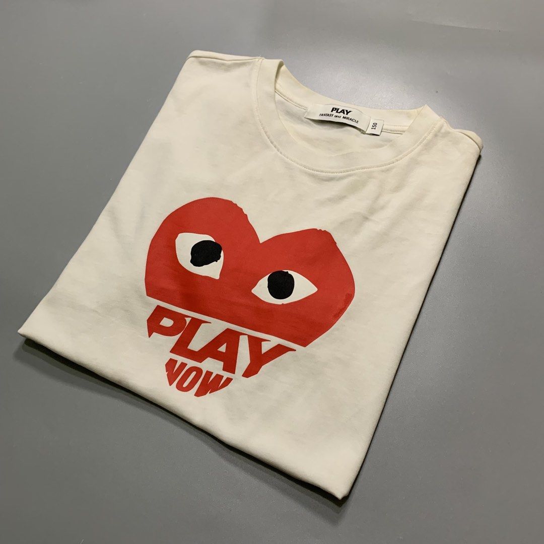 CDG PLAY FANTASY AND MIRACLE (Category: Shirts) located in Puerto Princesa. Submitted by kelvinfabr75674 (Listing ID 1466135839, Image 1). Description: Size S 19 width 24 length Cannot guarantee its authenticity NO ISSUE EXCELLENT CONDITION Color rate 9.5📌.