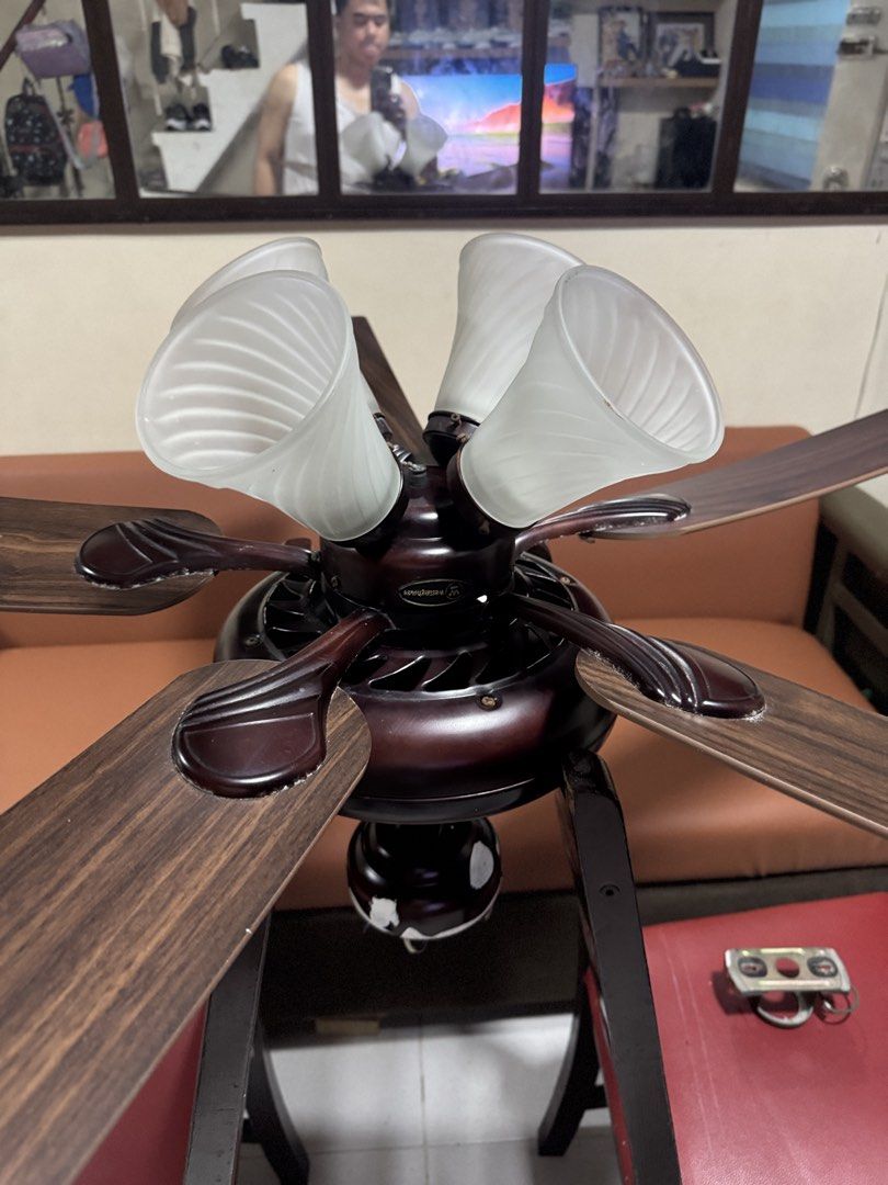 Ceiling Fan, Westinghouse 5 Blades 52”-inch. Rustic Bronze (Category: Fans) located in Manila. Submitted by jhondhellorena (Listing ID 1466121830, Image 1). Description: Westinghouse WH5SW52RB4 52-inch, Ceiling Fan with Light Provision. Body Finish: Rustic Bronze Wattage: 66 watts No. of Blade: 5-blades Blade Material: Wood Blade Finish: Mahogany / Rich Walnut (reversible side) hindi na po na gagamit, maayos na maayos pa, ok pa ang wiring at read