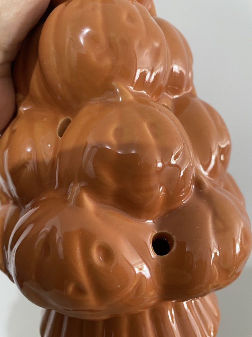 Ceramic Pumpkin Tree Autumn Decor Lantern (Category: Lighting) located in Baguio. Submitted by the_general_store (Listing ID 1466099659, Image 2). Description: - Glossy orange ceramic pumpkin tree - Stacked mini pumpkins form the tiers - Dotted holes allow light to shine through - Hollow base fits a tea light or small bulb - Ideal tabletop accent for fall and Halloween decorating *Dimensions: height 9”, base 3.75”, circumference 15” (widest part)