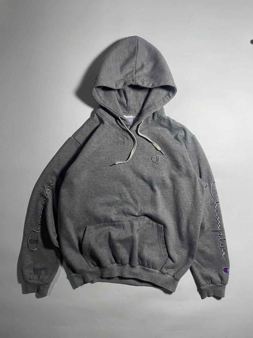 Champion sleeve script hoodie (Category: Hoodies) located in Bais. Submitted by christian.complexthrift08 (Listing ID 1466092914, Image 1). Description: Champion sleeve script hoodie (Embroidered script design) Color: Grey Size: Medium boxy fit Width: 23 inches Length: 25 inches Condition: 9 / 10 Issue: Loose stitch sa armpit Lints Price: 399 + SF Via JNT express.