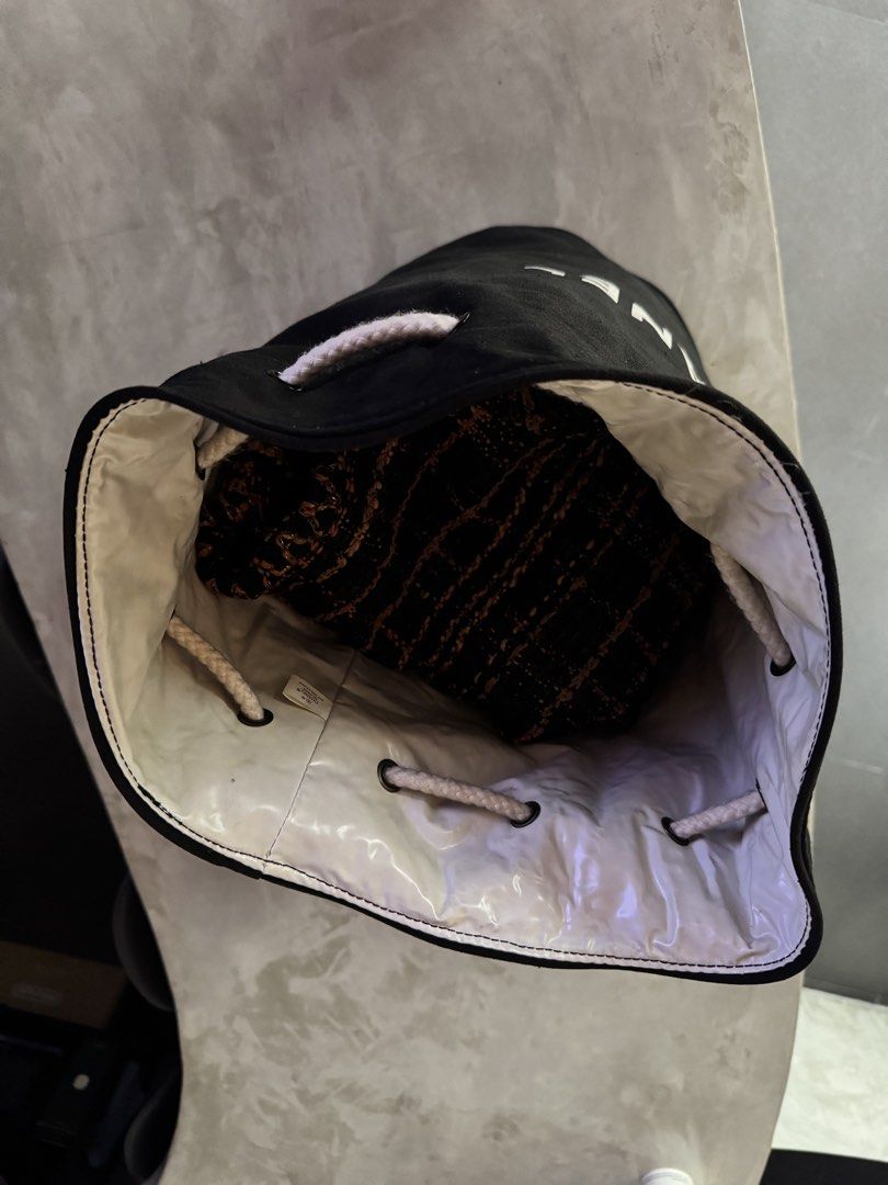Chanel Black Canvas Drawstring Bucket Bag (Category: Luxury Bags & Wallets) located in Manila. Submitted by thevintage90_sretro. (Listing ID 1465998677, Image 3). Description: Chanel Black Canvas Drawstring Bucket Bag one size legit dm for inquiries.