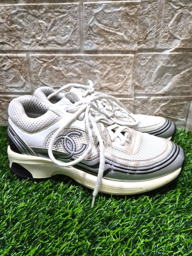 Chanel Fabric & Laminated White & Silver Sneakers (Category: Sneakers & Footwear) located in Antipolo. Submitted by saribymonica (Listing ID 1466129897, Image 2). Description: 👟 CHANEL Laminated & Fabric CC Runner Sneakers 👟 Size: 36 EU Condition: Beautifully clean, structured, and ready to wear! About this pair: Absolute luxury meets street style. These feature the iconic chunky silhouette with double CC branding on the side, laces, and sole t
