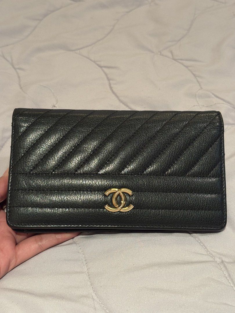 Chanel Long Wallet (Category: Luxury Bags & Wallets) located in Pasay City. Submitted by iflyph (Listing ID 1466154862, Image 1). Description: - Authentic Chanel wallet - Black textured leather - Multiple card slots - Bill compartments - Coin storage 1 flaw card slot fabric inside needs stitching hence selling low (see last pic) everything else in good condition beautiful in actual 7/10 condition guaranteed authentic or money back no return no ex