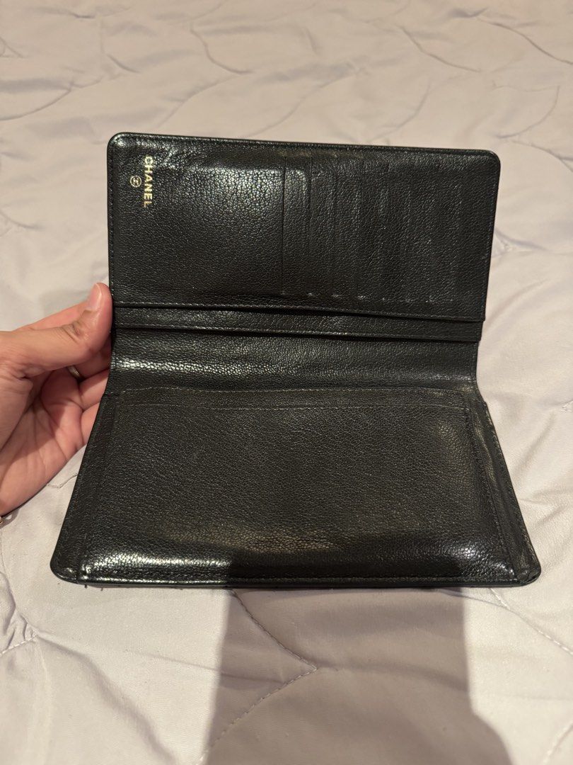 Chanel Long Wallet (Category: Luxury Bags & Wallets) located in Pasay City. Submitted by iflyph (Listing ID 1466154862, Image 2). Description: - Authentic Chanel wallet - Black textured leather - Multiple card slots - Bill compartments - Coin storage 1 flaw card slot fabric inside needs stitching hence selling low (see last pic) everything else in good condition beautiful in actual 7/10 condition guaranteed authentic or money back no return no ex