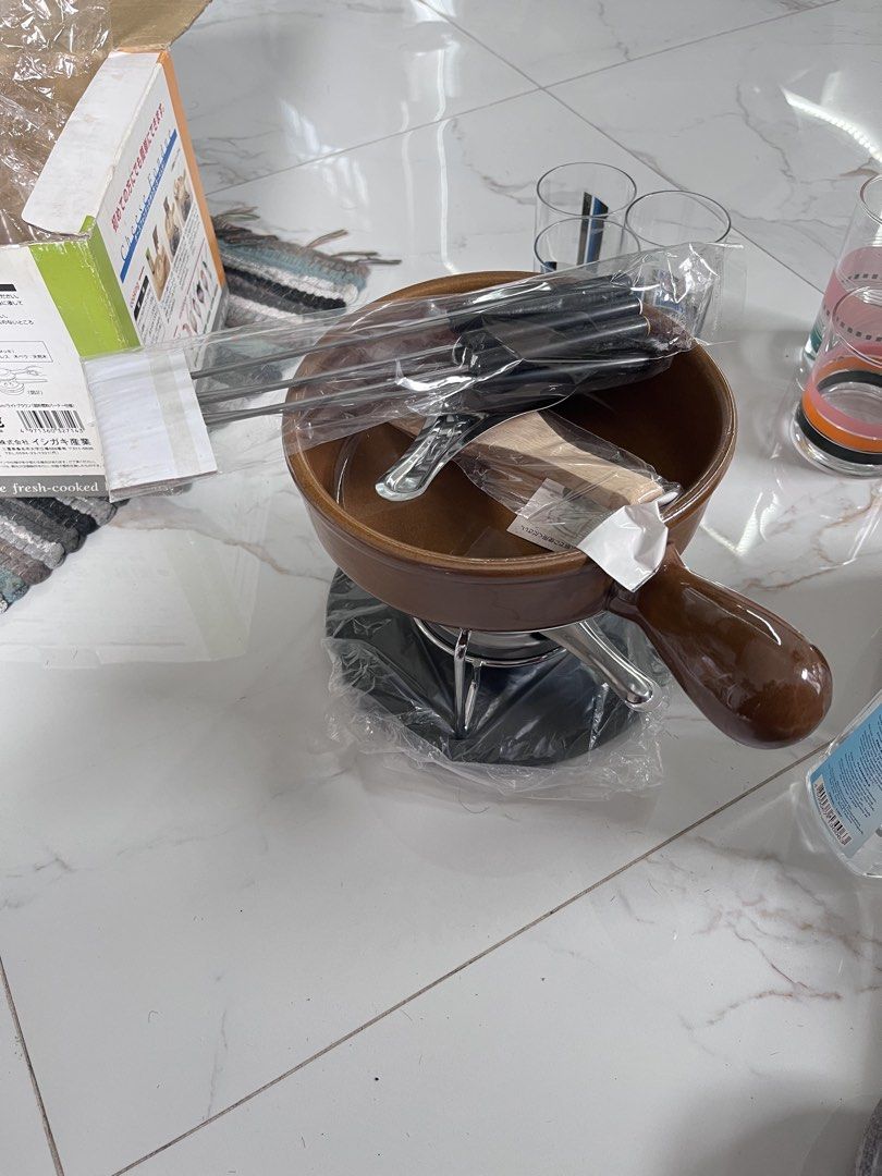 Cheese Fondue Set 17cm Light Brown (Category: Cookware & Accessories) located in Quezon City. Submitted by altheakatecollection (Listing ID 1465994507, Image 2). Description: - Complete 17cm cheese fondue set in a chic light brown color - Brand new, still packed in original plastic wrap and box - Includes ceramic pot, metal stand, base plate, multiple fondue forks, and a wooden spatula - Perfect for family dinners, date nights, and holiday partie