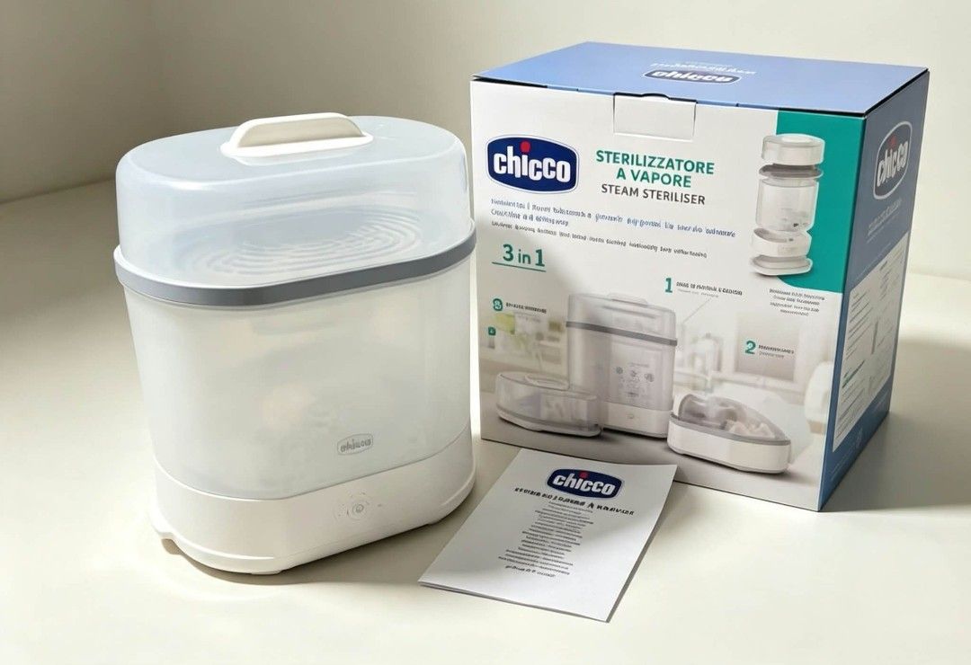 Chicco 3 in 1 Steam Steriliser (Category: Breastfeeding & Bottle Feeding) located in Manila. Submitted by kimmy10182 (Listing ID 1465992956, Image 2). Description: - Chicco 3-in-1 steam steriliser with translucent lid and base - Includes original packaging box and instruction manual - Very clean condition and well-maintained - Keeps baby bottles and accessories sterile for daily feeds - Compact design takes up minimal counter space - Simple setup
