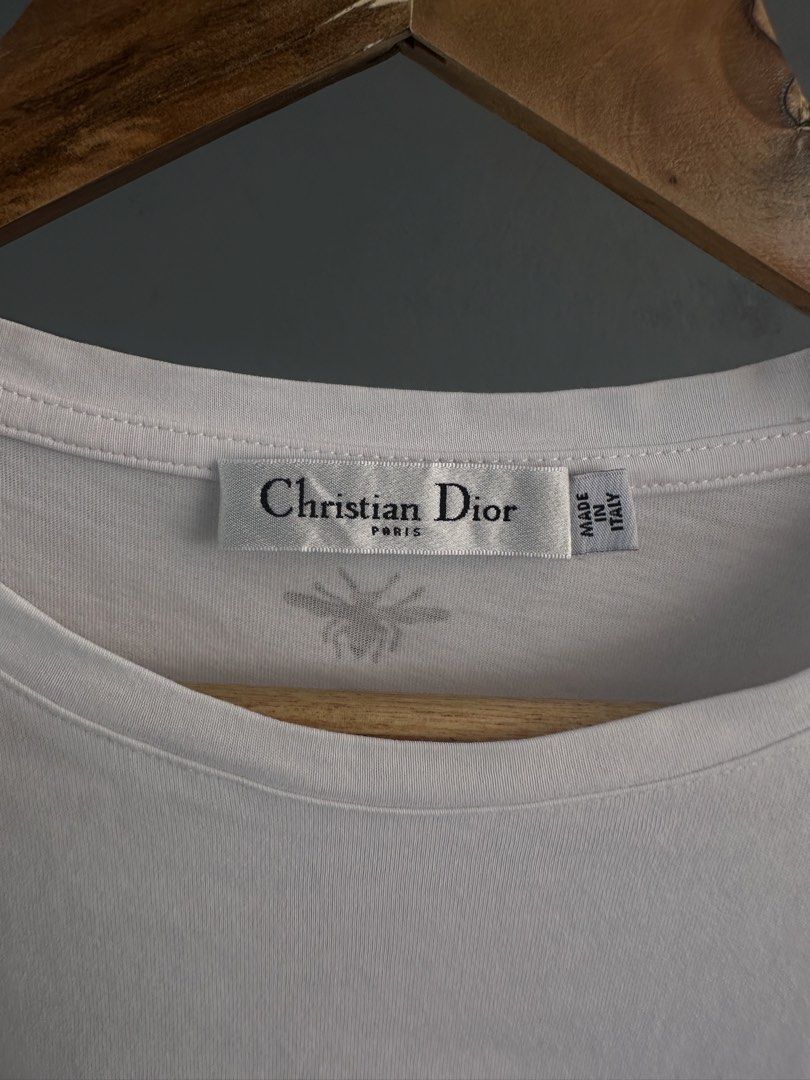 Christian Dior - Floral Print tee (Category: Blouses) located in Pasig City. Submitted by worn2wice (Listing ID 1466003615, Image 3). Description: Size Large but fits Medium Measurements (in) Width 18.5 Length 23 Sleeve Length 7 Excellent condition Issue: No copyright infringement intended. This post is for resale purposes only. All trademarks, logos, and brand names belong to their respective owners..