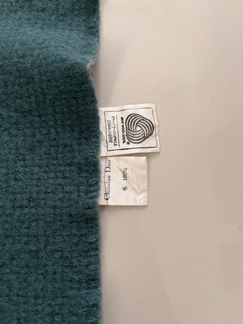 Christian Dior Wool Throw Blanket (Category: Bedding & Towels) located in Candelaria. Submitted by excommunicado_ (Listing ID 1465986394, Image 3). Description: Christian Dior Wool Blanket One size Dimensions: Length - 46” Width - 28” - Authentic Christian Dior scarf - Made from 100% wool - Features iconic CD logo embroidery - Perfect for stylish warmth Excellent condition No inclusions Note: Feel free to ask questions before purchasing .