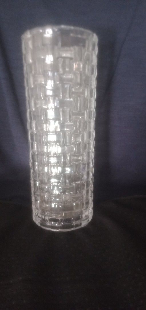 Clear Glass Cylinder Vase Woven Basket Texture Pattern (Category: Vases & Decorative Bowls) located in Caloocan City. Submitted by teamgoodbuys (Listing ID 1465957716, Image 1). Description: - Clear glass vase featuring a trendy woven basket texture all around the cylinder body - Sturdy and thick glass construction with a flat, stable base - Versatile size ideal for both fresh flowers and dry stems - Neutral transparent look that complements any 