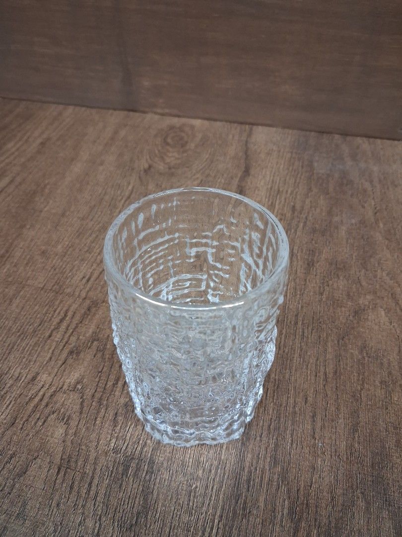 Clear textured glass tumbler with bark pattern (Category: Water Bottles & Tumblers) located in Taguig. Submitted by ssvcn (Listing ID 1465971787, Image 2). Description: - Material: Clear glass - Exterior: Unique bark-like textured finish - Interior: Smooth surface for easy cleaning and comfortable drinking - Base: Thick and sturdy for stability - Ideal for: Water, juice, iced coffee, and daily use - Design: Simple and modern, matches any kitchenw