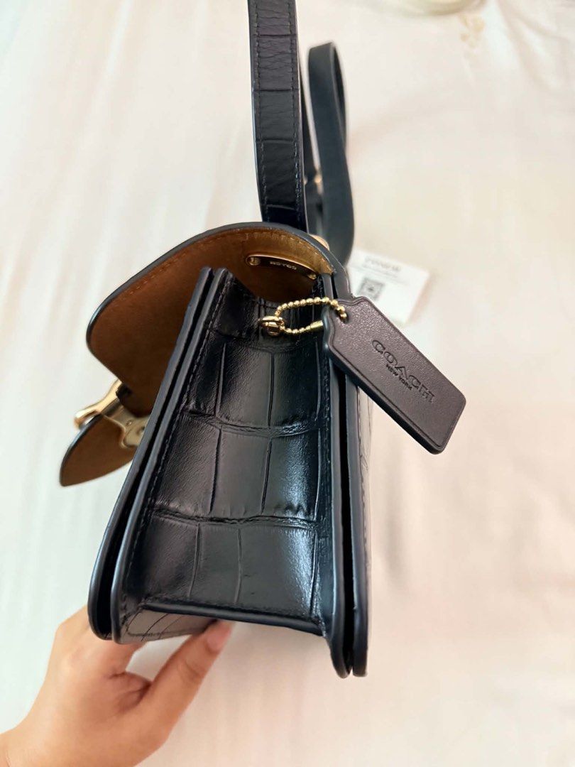 Coach Black Croc Embossed Leather Crossbody Bag (Category: Cross-body Bags) located in Manila. Submitted by flywithmigs21 (Listing ID 1466086556, Image 3). Description: Coach Morgan Square Crossbody Bag in Crocodile-Embossed Leather Seldomly used Some tarnish on gold hardware RFS: decluttering.