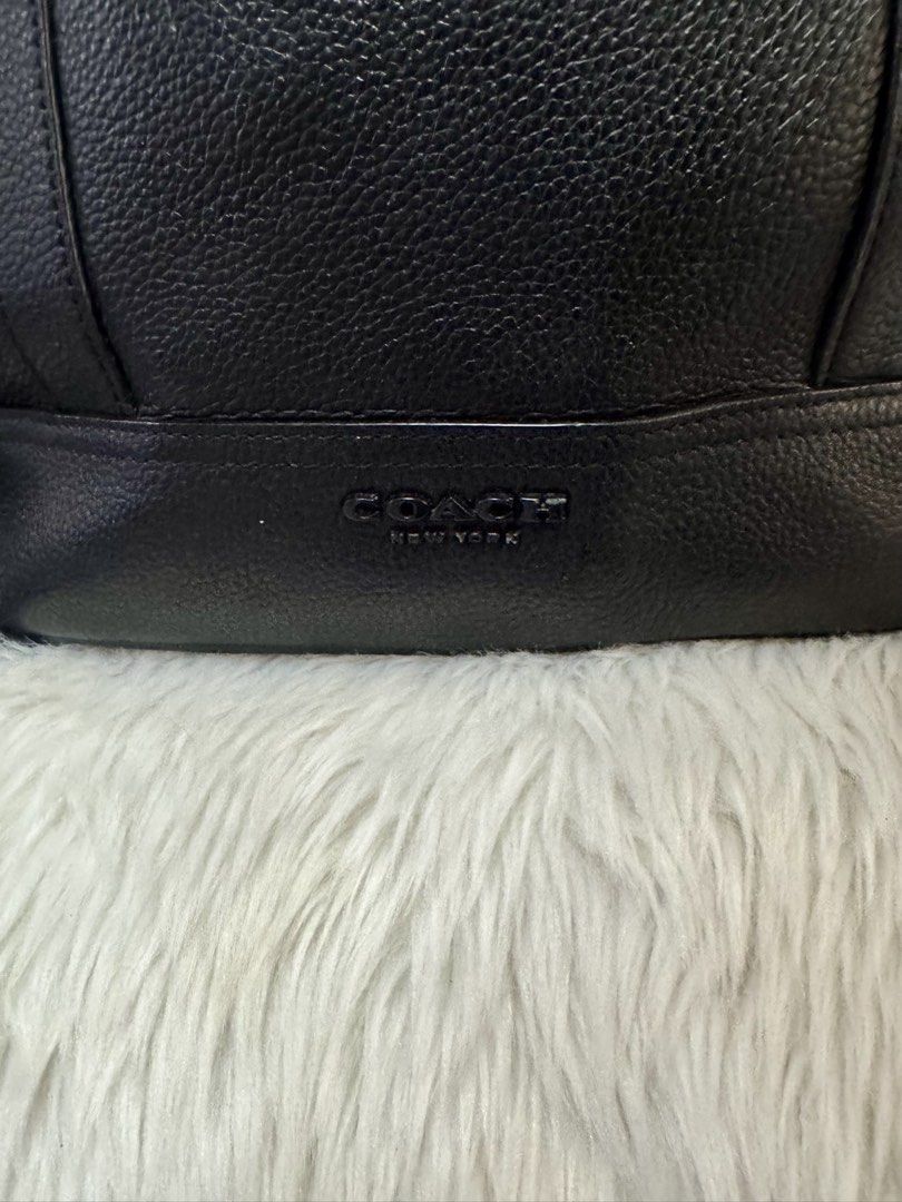 Coach Hudson Backpack (Category: Backpacks) located in Malolos. Submitted by urban_thrift_09 (Listing ID 1466027272, Image 2). Description: -Coach Hudson Backpack in black natural pebble leather. -Flap and drawstring main closure, dual buckled straps, exterior side flap pockets, top grab handle, and an internal tech/laptop sleeve. -Black natural pebble leather with gunmetal-tone hardware -Made in Philippines -Details in photos.