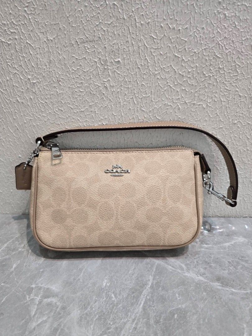 Coach Kili Bag/Shoulder Bag (Category: Shoulder Bags) located in Manila. Submitted by ej.collections (Listing ID 1466041933, Image 3). Description: ✅ NEGOTIABLE PRICE 📩 DM FOR INQUIRES / SEND AN OFFER 💯 GUARANTEED AUTHENTIC •SIZE: SMALL •CONDITION: LOOKS NEW ON HAND / READY TO SHIP 📍DAVAO CITY.