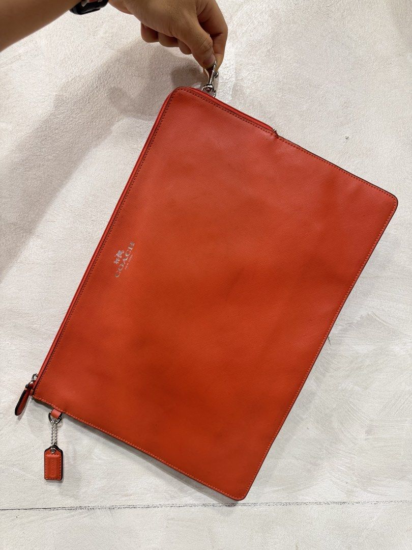 Coach Large Clutch Bag (Category: Clutches) located in Makati City. Submitted by dailypickups_ (Listing ID 1466110053, Image 1). Description: In excellent condition Dimensions Width: 14” Height: 10” .