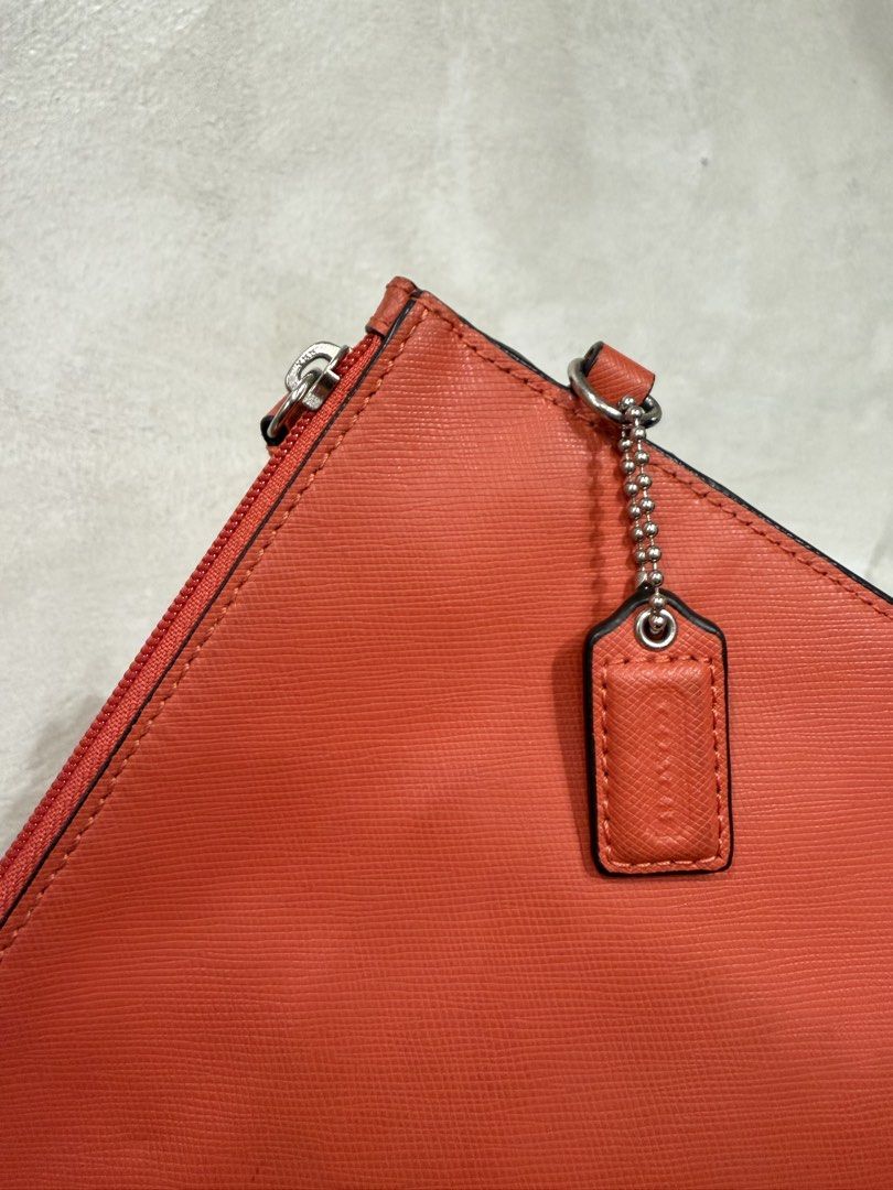 Coach Large Clutch Bag (Category: Clutches) located in Makati City. Submitted by dailypickups_ (Listing ID 1466110053, Image 3). Description: In excellent condition Dimensions Width: 14” Height: 10” .