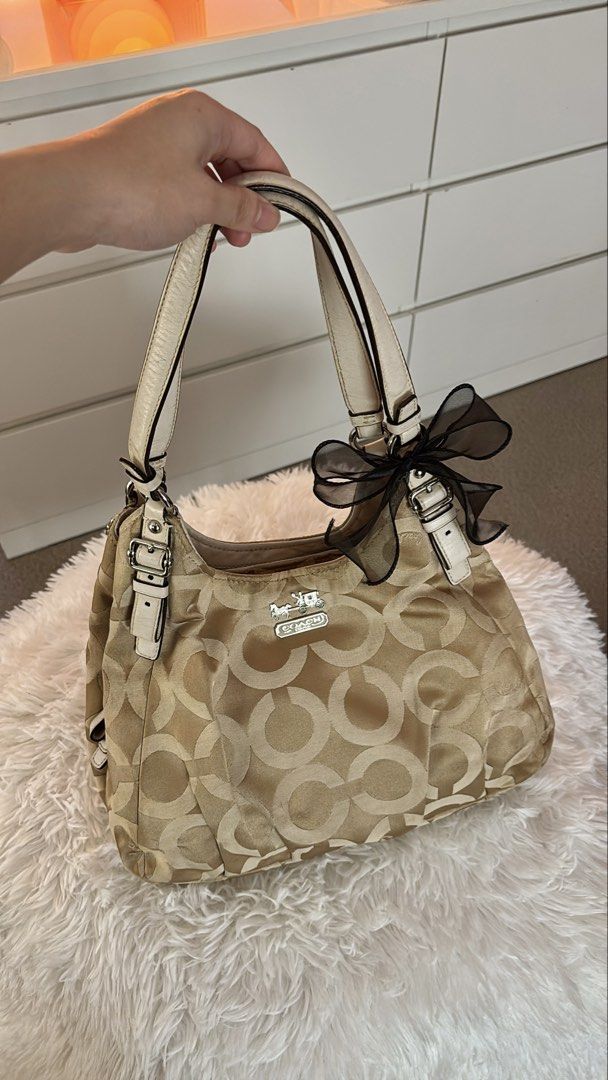 Coach Madison (Category: Luxury Bags & Wallets) located in Cavite. Submitted by helpdeclutterthisgirl (Listing ID 1466087281, Image 1). Description: Coach Madison Shoulder Bag 🏷️ ₱ 2,999 - guaranteed authentic - clean interior - good condition - clean canvas - normal sign of usage .