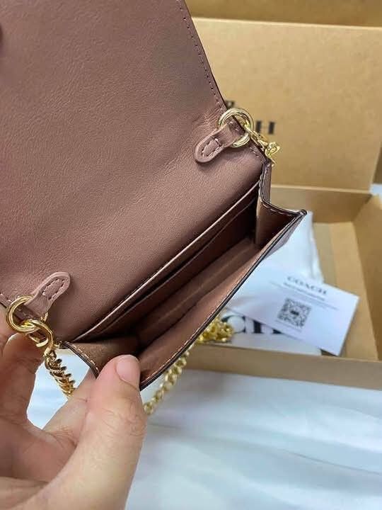 Coach Mini Wallet on Chain (Category: Wallets & Card holders) located in Quezon City. Submitted by bagsboutiqueph (Listing ID 1466154901, Image 2). Description: LAST PRICE POSTED. LIMITED STOCKS! BRANDNEW WITH INCLUSIONS. COLOR MAY SLIGHTLY VARY IN ACTUAL DUE TO LIGHTING AND CAMERA SETTING. OTHER PHOTOS WILL BE SEND DURING PURCHASE AND FOR SURE BUYERS ONLY. WHEN IN DOUBT, DO NOT ORDER. THANK YOU..