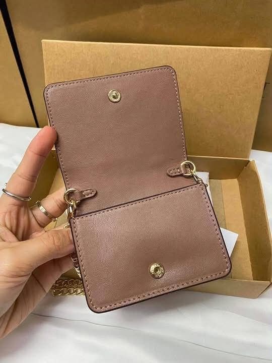Coach Mini Wallet on Chain (Category: Wallets & Card holders) located in Quezon City. Submitted by bagsboutiqueph (Listing ID 1466154901, Image 3). Description: LAST PRICE POSTED. LIMITED STOCKS! BRANDNEW WITH INCLUSIONS. COLOR MAY SLIGHTLY VARY IN ACTUAL DUE TO LIGHTING AND CAMERA SETTING. OTHER PHOTOS WILL BE SEND DURING PURCHASE AND FOR SURE BUYERS ONLY. WHEN IN DOUBT, DO NOT ORDER. THANK YOU..
