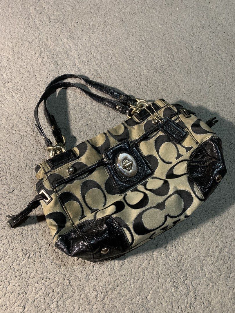 Coach Peyton OP Art Signature (Category: Tote Bags) located in Manila. Submitted by kenetoy (Listing ID 1466106516, Image 2). Description: Coach Peyton OP Art Signature - Classic monogram style in khaki/black with light blue interior - Works perfectly, all zippers & hardware functional - Minor signs of use: faint interior stains, slight peeling on handle trim, normal wear on fabric 🏷️ 2000.