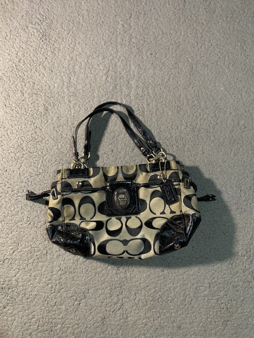 Coach Peyton OP Art Signature (Category: Tote Bags) located in Manila. Submitted by kenetoy (Listing ID 1466106516, Image 1). Description: Coach Peyton OP Art Signature - Classic monogram style in khaki/black with light blue interior - Works perfectly, all zippers & hardware functional - Minor signs of use: faint interior stains, slight peeling on handle trim, normal wear on fabric 🏷️ 2000.