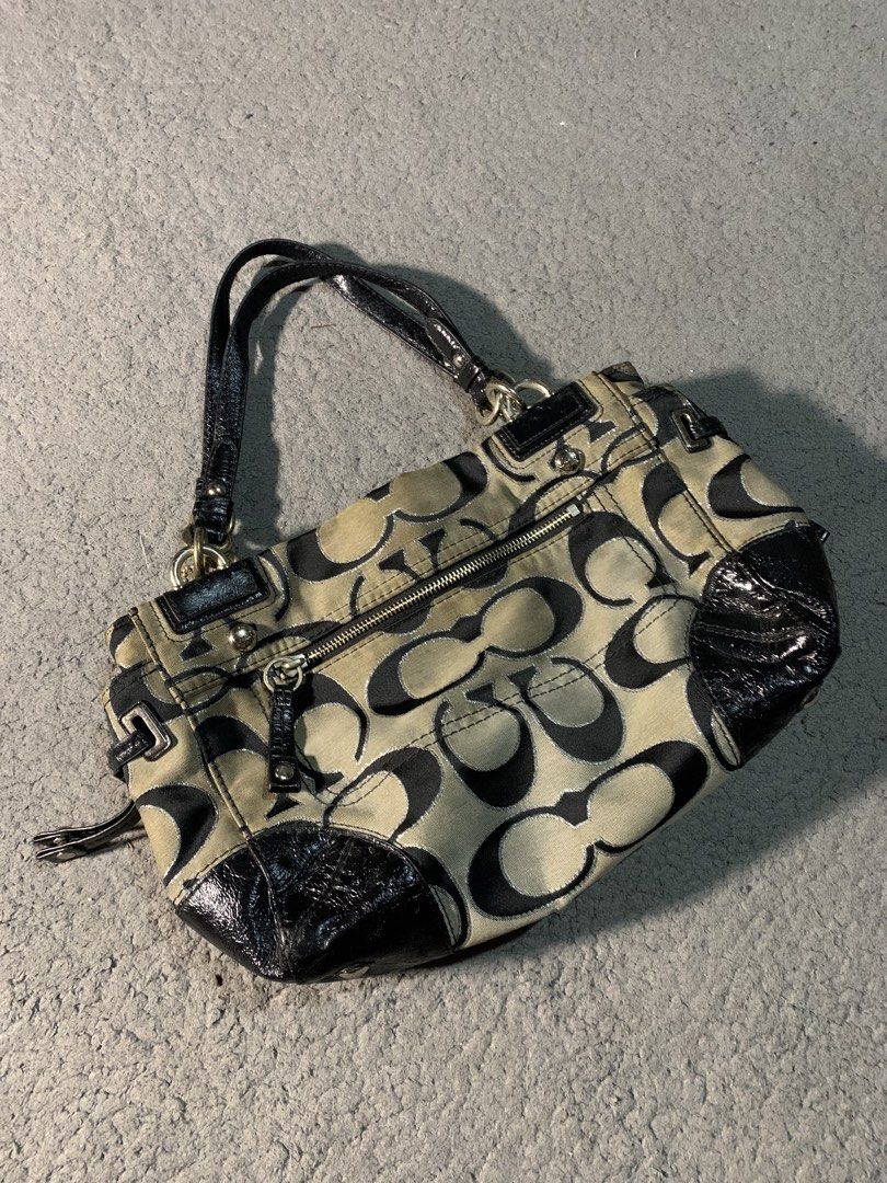 Coach Peyton OP Art Signature (Category: Tote Bags) located in Manila. Submitted by kenetoy (Listing ID 1466106516, Image 3). Description: Coach Peyton OP Art Signature - Classic monogram style in khaki/black with light blue interior - Works perfectly, all zippers & hardware functional - Minor signs of use: faint interior stains, slight peeling on handle trim, normal wear on fabric 🏷️ 2000.