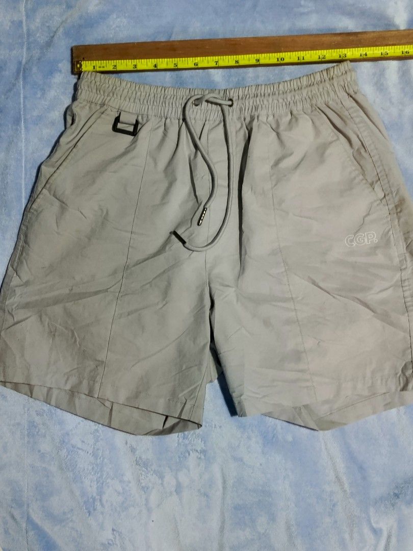 Code:graphy CGP Utility Function Shorts Light Grey Size S (Category: Shorts) located in City of Isabela. Submitted by warmbird.d06e6f (Listing ID 1465969726, Image 1). Description: - Brand/Model: Code:graphy Utility Shorts - Color: Light Grey - Size: S (Waist: 14-15 inches laid flat) - Fit: Elastic waistband with adjustable drawstring closure - Details: Front utility loop, back pockets with CGP logo patch - Style: Techwear aesthetic featuring ind