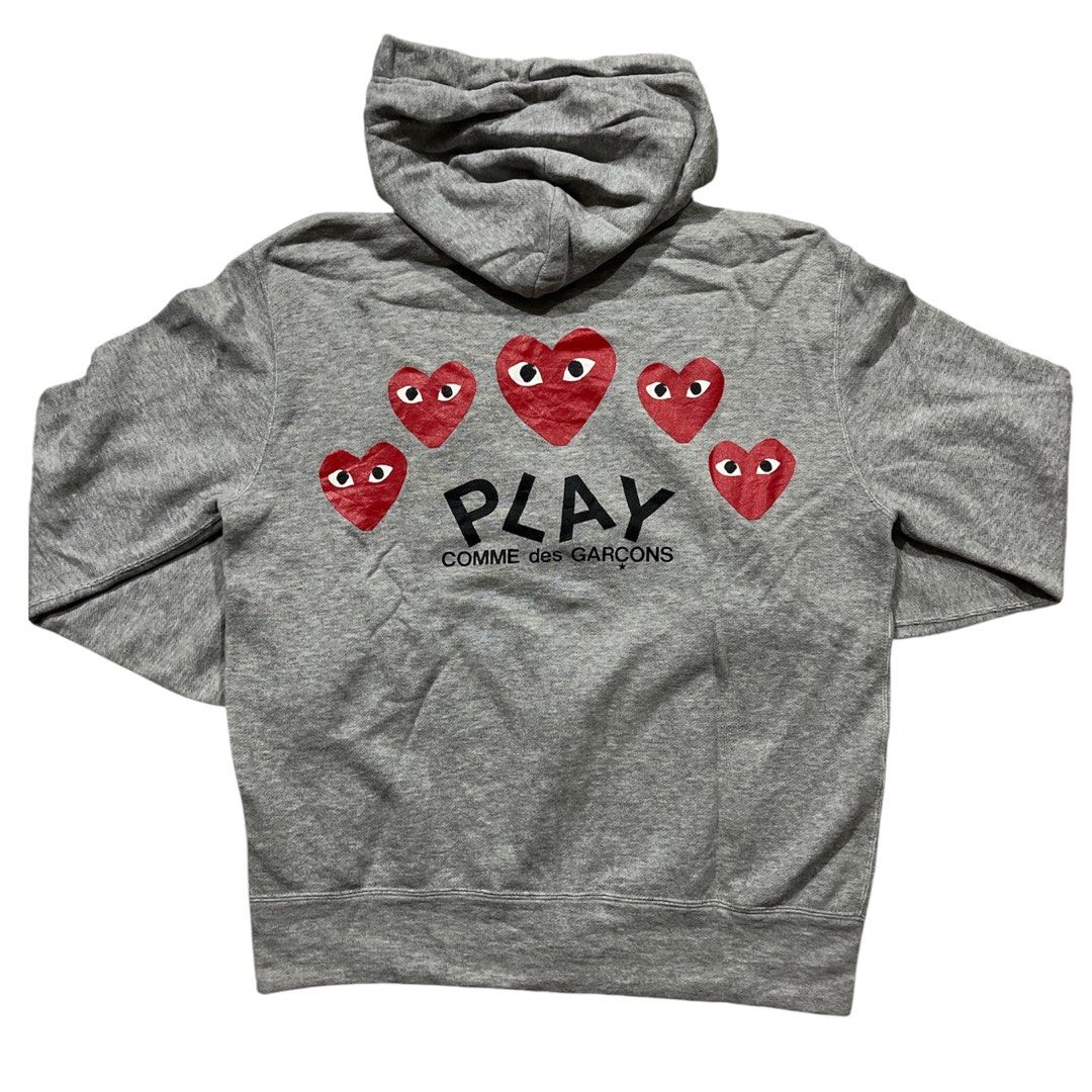 Comme Des Garcons Play Zip Up Hoodie (Category: Hoodies) located in Tubao. Submitted by elyu_grails (Listing ID 1466064365, Image 2). Description: Comme Des Garcons Play Zip Up Hoodie Almond Eye Heart Featuringthe brand’s signature embroidered red heart logo on the chest. Size Medium on tag Dimes 21x25.5 Excellent condition No major issues 1190+sf Feel free to negotiate 👌🏽.