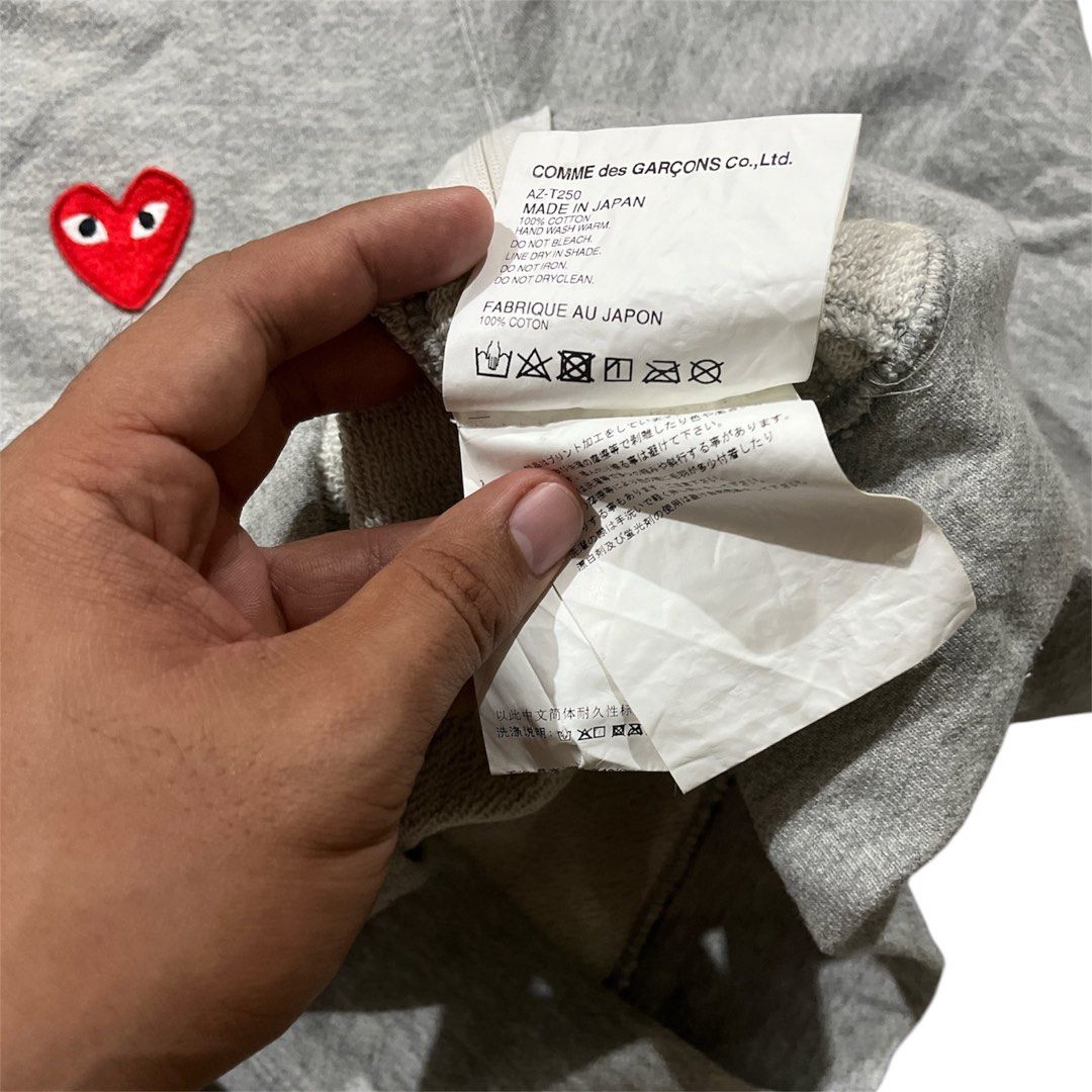 Comme Des Garcons Play Zip Up Hoodie (Category: Hoodies) located in Tubao. Submitted by elyu_grails (Listing ID 1466064365, Image 3). Description: Comme Des Garcons Play Zip Up Hoodie Almond Eye Heart Featuringthe brand’s signature embroidered red heart logo on the chest. Size Medium on tag Dimes 21x25.5 Excellent condition No major issues 1190+sf Feel free to negotiate 👌🏽.