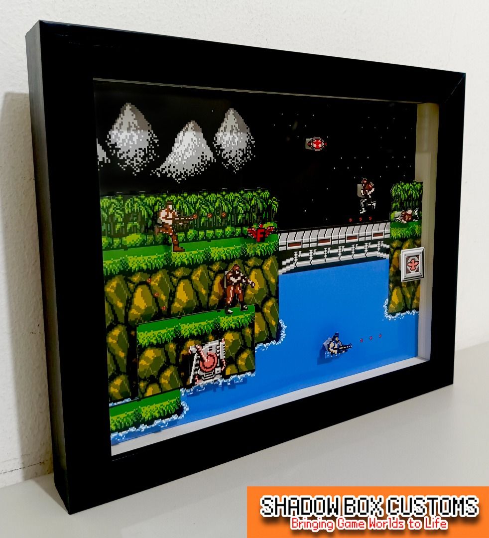 Contra Video Game Shadow Box (Category: Nintendo) located in Quezon City. Submitted by natzuki10 (Listing ID 1465969013, Image 3). Description: Contra Video Game Shadow Box Height: 10 inches Width: 8 inches *Handmade Pixel Shadow Boxes *Accepting Customized Designs *Perfect for Gamers & Collectors #giftideas #roomdecor #videogame #retrogame.