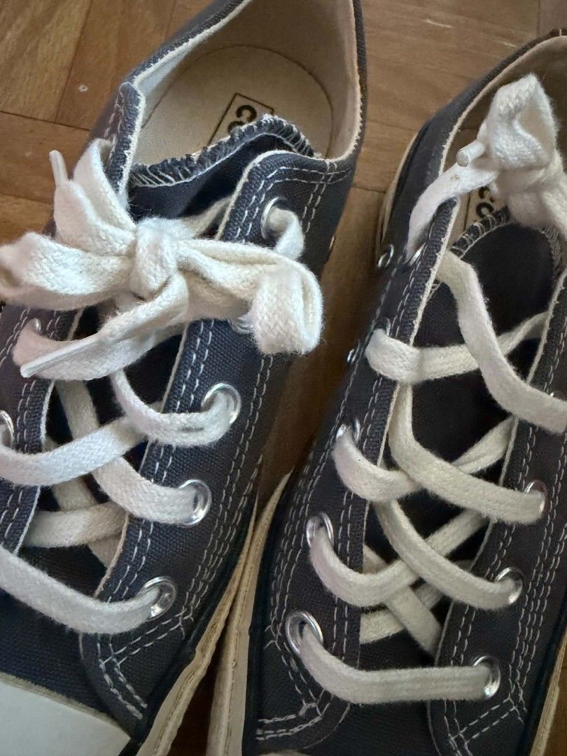 Converse Chuck Taylor All Star 70 Low Grey (Category: Sneakers) located in Manila. Submitted by jigs30 (Listing ID 1465979859, Image 3). Description: - Brand: Converse Chuck Taylor All Star 70 - Style: Low top sneakers - Color: Dark grey canvas with off-white laces and midsoles - Details: Classic vulcanized rubber sole, black foxing stripe, black heel patch, and red inner tongue logo - Condition: Great pre-loved condition with minimal wear on sol