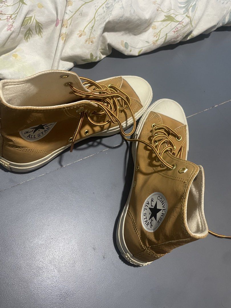 Converse Chuck Taylor All Star High Top Wheat (Category: Sneakers) located in Manila. Submitted by superaceeeee (Listing ID 1466036284, Image 3). Description: CONVERSE CHUCK 70 HIGH TOP Condition: 9/10 — good condition Size: US 7 / 25.5cm Color: Tan/Khaki Original Converse Actual photos posted No box Selling Price: 500 pesos PM if interested. Serious buyers only..