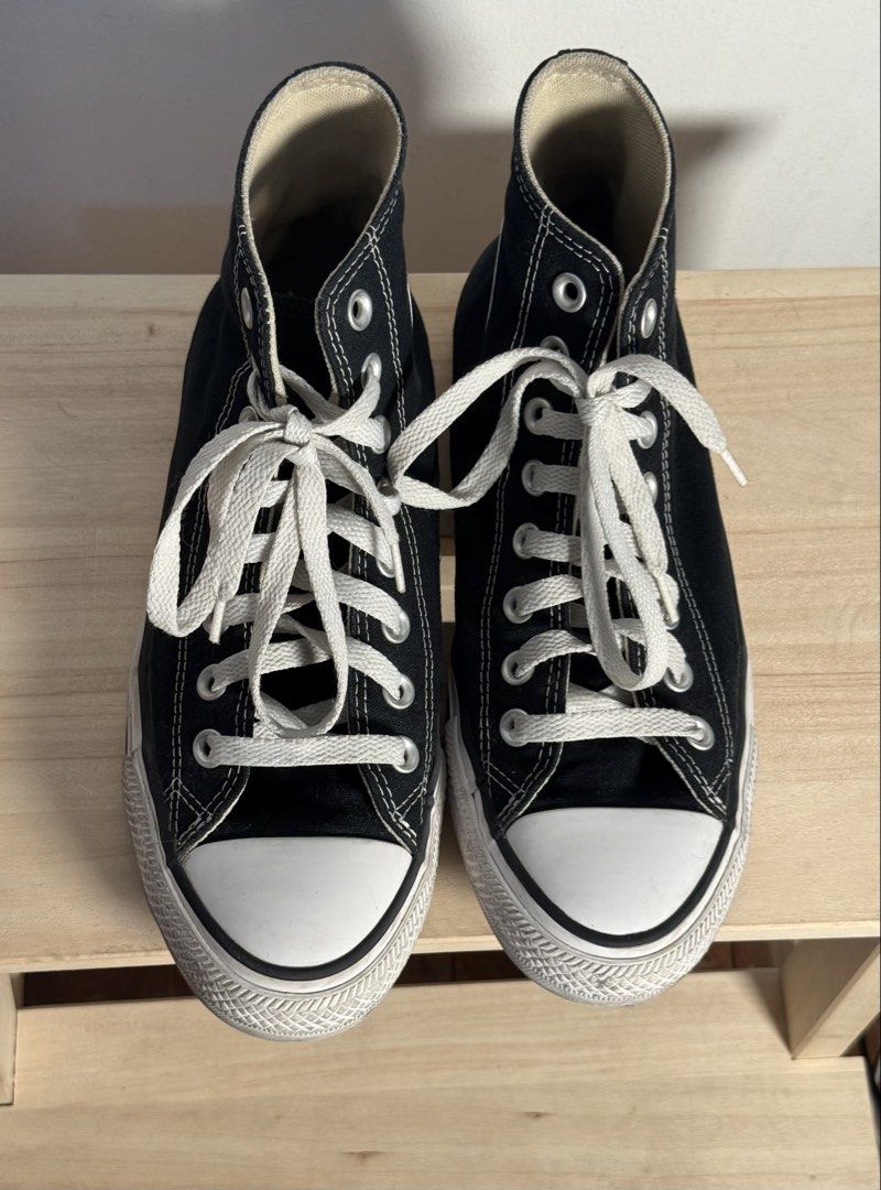 Converse Chuck Taylor All Star High Top Black (Category: Sneakers) located in Pasig City. Submitted by meowstuff_ (Listing ID 1466073575, Image 3). Description: - Classic black high top sneakers from Converse. - White laces and toe caps. - Rubber soles with minor dirt marks around the edges from normal wear. - Fabric uppers intact and clean. - Great everyday kicks that go with almost any casual outfit, feet does not hurt wearing these. - Size: Me