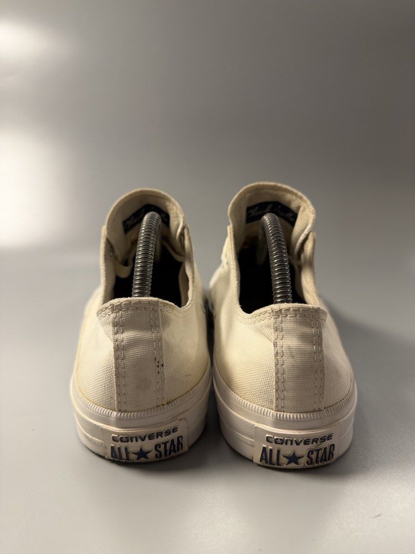 Converse Chuck Taylor All Star Low Top White (Category: Sneakers) located in Quezon City. Submitted by markieexp (Listing ID 1466092827, Image 3). Description: Classic white Converse Chuck Taylor low top sneakers. Men size 8, Women size 10, EUR 41.5. Canvas upper with rubber toe cap and brown rubber outsole. Standard lace-up design with metal eyelets. Made in Vietnam. Noticeable yellowing and minor scuffs on the fabric and soles from regular wear