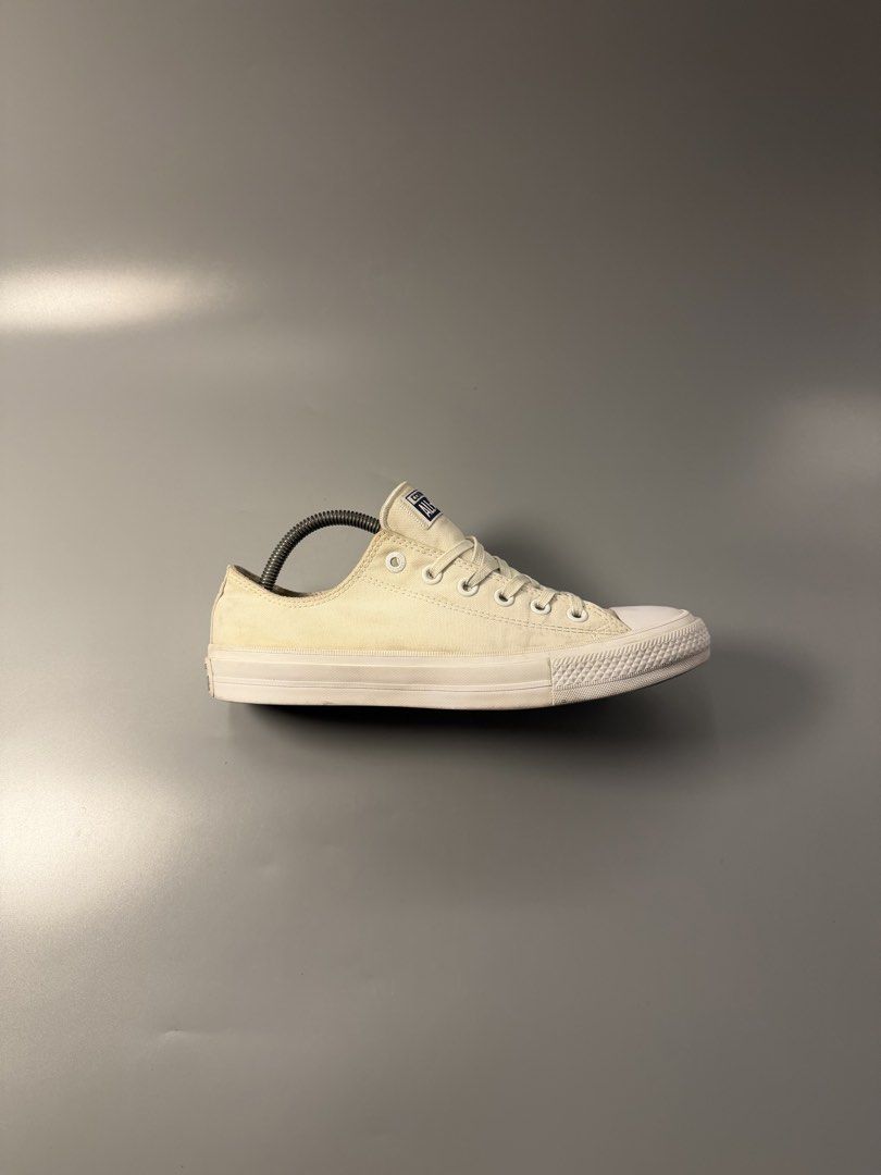 Converse Chuck Taylor All Star Low Top White (Category: Sneakers) located in Quezon City. Submitted by markieexp (Listing ID 1466092827, Image 2). Description: Classic white Converse Chuck Taylor low top sneakers. Men size 8, Women size 10, EUR 41.5. Canvas upper with rubber toe cap and brown rubber outsole. Standard lace-up design with metal eyelets. Made in Vietnam. Noticeable yellowing and minor scuffs on the fabric and soles from regular wear