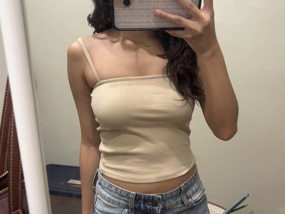 Cotton on beige ribbed square neck spaghetti strap top (Category: Sleeveless) located in Paranaque City. Submitted by domisclosett (Listing ID 1466093768, Image 2). Description: - Color: Beige - Style: Form-fitting ribbed crop top with square neckline and thin straps loc: parañaque/muntinlupa area mop: gcash, maribank, gotyme mod: lalamove or j&t, sf c/o buyer.