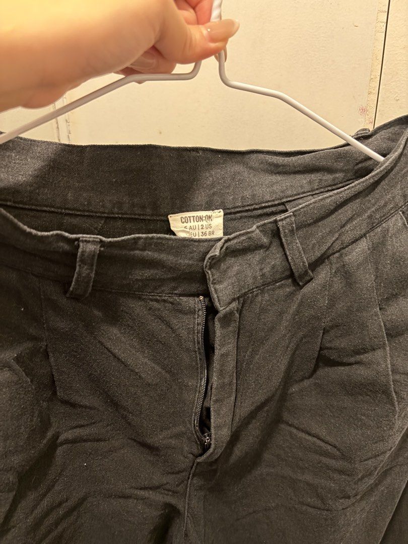 Cotton On Black Linen Pleated Pants (Category: Other Bottoms) located in Pasay City. Submitted by notellyyyy (Listing ID 1465991566, Image 3). Description: - Brand: Cotton On - Color: Washed black - Style: Straight leg with front pleats - Details: Regular waistband with belt loops, zip fly, two back welt pockets - Condition: Good, with slight wrinkling from storage - Pairing: Great for casual tees and button-down shirts.