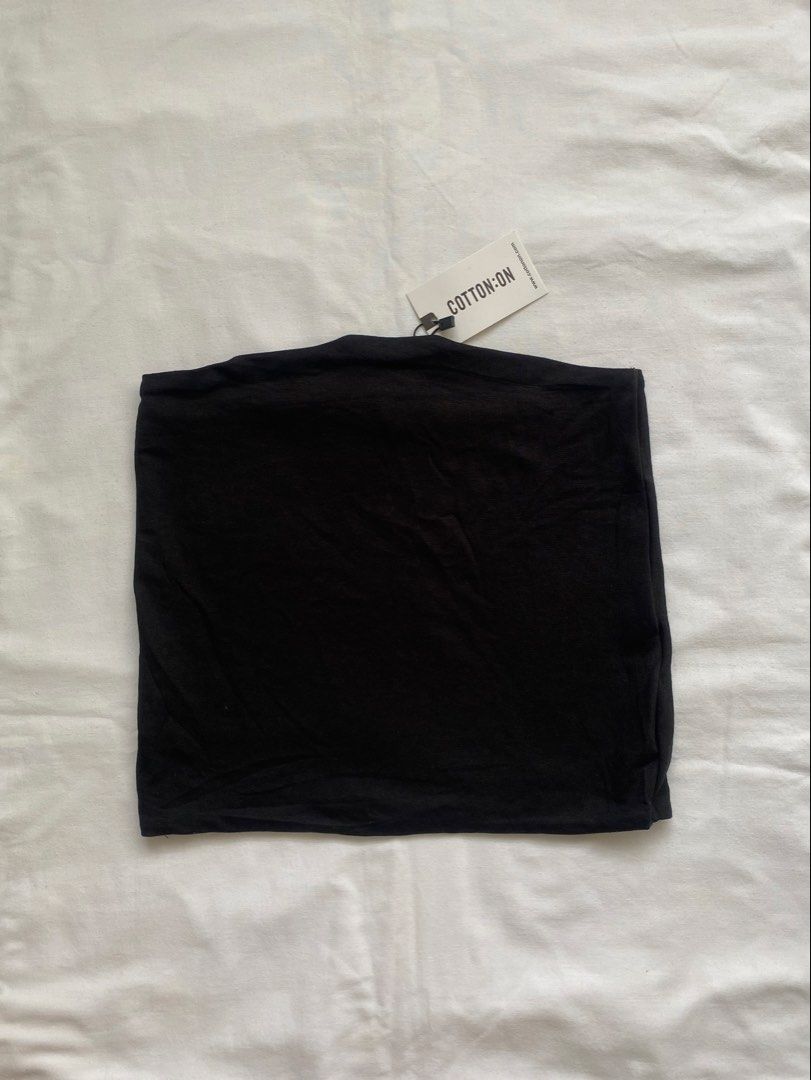 Cotton On Black Tube Top (Category: Sleeveless) located in Valenzuela. Submitted by mandies_25 (Listing ID 1465978286, Image 1). Description: - Brand: Cotton On - Color: Black - Style: Simple strapless tube top - Condition: Brand new with original store tags, never worn - Material: Stretchy and comfortable fabric - Versatility: Great for layering or wearing on its own - Size: Small -OVERRUNS.