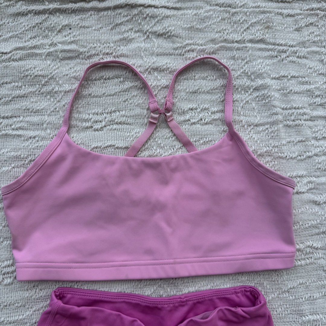 Cotton On Body Pink Activewear Set (Category: Activewear) located in Manila. Submitted by thriftclub.ph (Listing ID 1466093384, Image 2). Description: ▫️Decluttering (too many sportswear!) ◻️ Fits xs - s ⬜️ With pad slots, no pads ⚪️ Bottoms with scrunch butt design ⬜️ Top has clasp to make it “x” style ◻️ Sold as set ▫️ Super cute to wear for Pilates / Yoga .