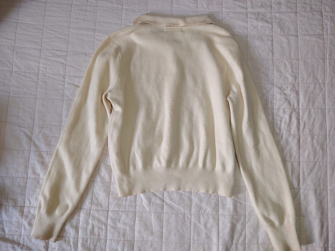 Cream Collared Knitted Sweater With Flower Buttons (Category: Longsleeves) located in Tarlac. Submitted by your_finds (Listing ID 1465998175, Image 2). Description: Description: - S-M ang size - Color cream - Design lang ang buttons Condition: 8/10 / Good condition Issue: Himulmol at stain Medida size (inch) Bust: 34-37 Length: 18.5.
