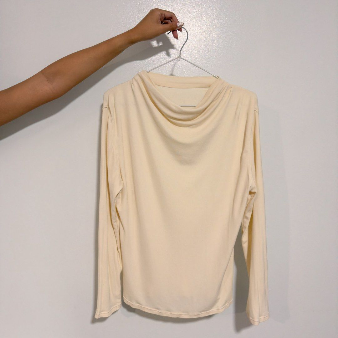cream long sleeve top (Category: Longsleeves) located in Cebu City. Submitted by cuteoncue (Listing ID 1466153172, Image 2). Description: large-xl (large on tag) please see last photo for washable stains and minor pinholes. the item was freshly laundered but not soaked or stain-treated..