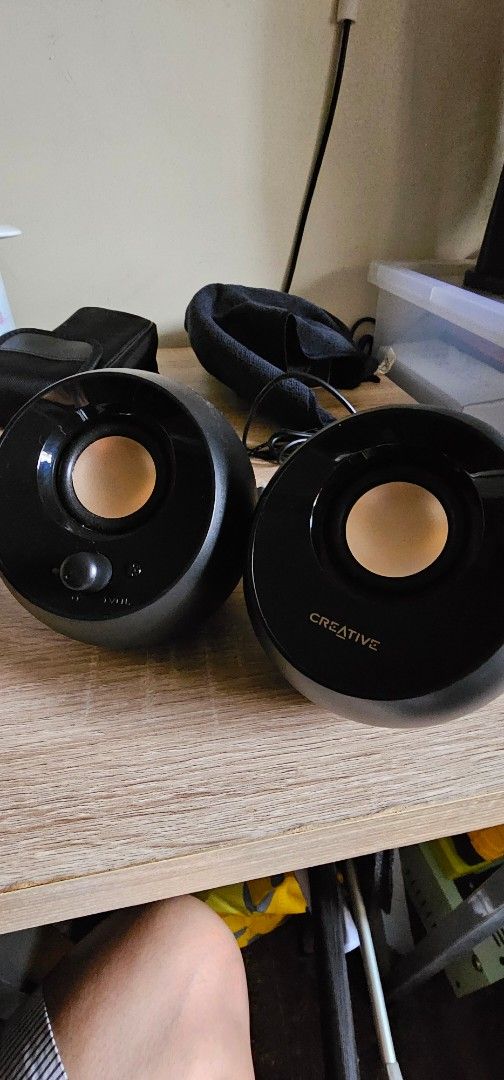 Creative desktop speakers audio system (Category: Soundbars, Speakers & Amplifiers) located in Quezon City. Submitted by safeforest.492237 (Listing ID 1465958427, Image 2). Description: - Stylish Design: Unique black spherical body with striking gold-tone drivers - Compact & Space-Saving: Small footprint, ideal for clean and minimalist computer setups - Easy Controls: Convenient volume dial and power button built right into the front of one unit 