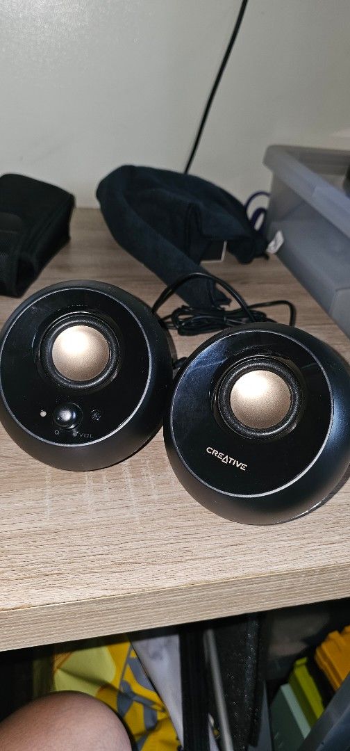Creative desktop speakers audio system (Category: Soundbars, Speakers & Amplifiers) located in Quezon City. Submitted by safeforest.492237 (Listing ID 1465958427, Image 1). Description: - Stylish Design: Unique black spherical body with striking gold-tone drivers - Compact & Space-Saving: Small footprint, ideal for clean and minimalist computer setups - Easy Controls: Convenient volume dial and power button built right into the front of one unit 