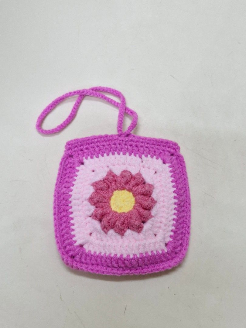 Crochet Granny Square Flower Bag Charm Pouch (Category: Handmade Craft) located in Paranaque City. Submitted by mi_artesano_mnl (Listing ID 1466029599, Image 2). Description: Handmade Crochet Granny Square Bag Charm Pouch 🌼 Cute and useful little pouch that you can attach to your bag! 💕 ✨ Handmade crochet ✨ Granny square design ✨ Perfect for coins, earphones, small essentials or little keepsakes ✨ Can also be used as a cute bag charm ✨ Great fo