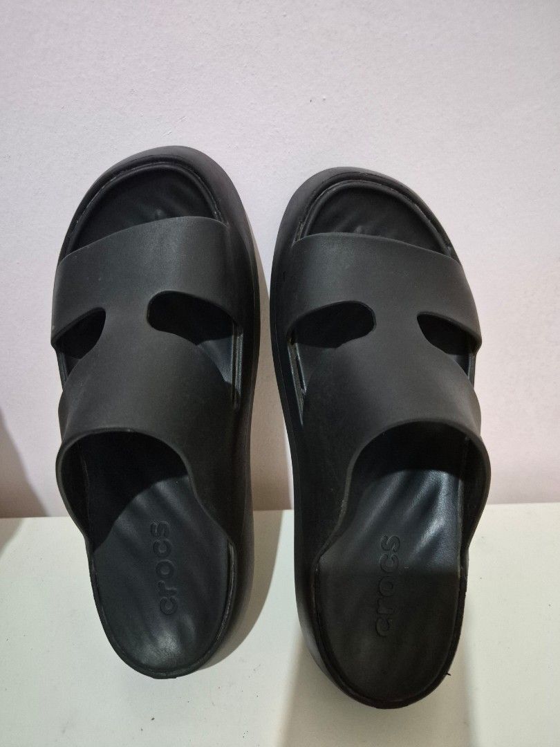 Crocs Black Getaway Platform H-Strap Sandals (Category: Sandals) located in Angeles City. Submitted by bloomingals (Listing ID 1466018973, Image 3). Description: Crocs Getaway platform sandals in black. H-strap design with thick comfortable soles. Women's size 6. Easy slip-on style with classic lightweight foam construction. Clean condition overall, minimal wear on the tread. Great option for casual daily wear..