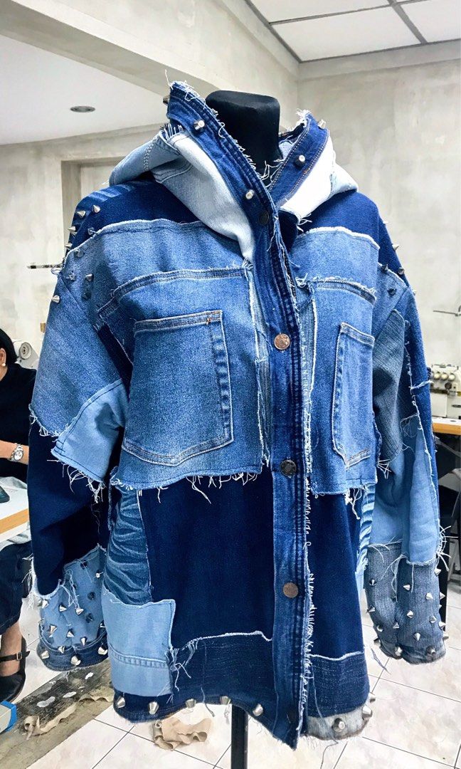 Custom Studded Denim Patchwork Jacket with Hood and Horns (Category: Coats, Jackets and Outerwear) located in Taguig. Submitted by aphroditexelliz08 (Listing ID 1466135616, Image 3). Description: • Custom Designer made heavy denim jacket with a unique patchwork design • Features metal spike studs along the sleeves, hood, and hem • Built-in hood includes two fabric bunny ears and a small zipped pocket detail • Accented with multiple mismatched den