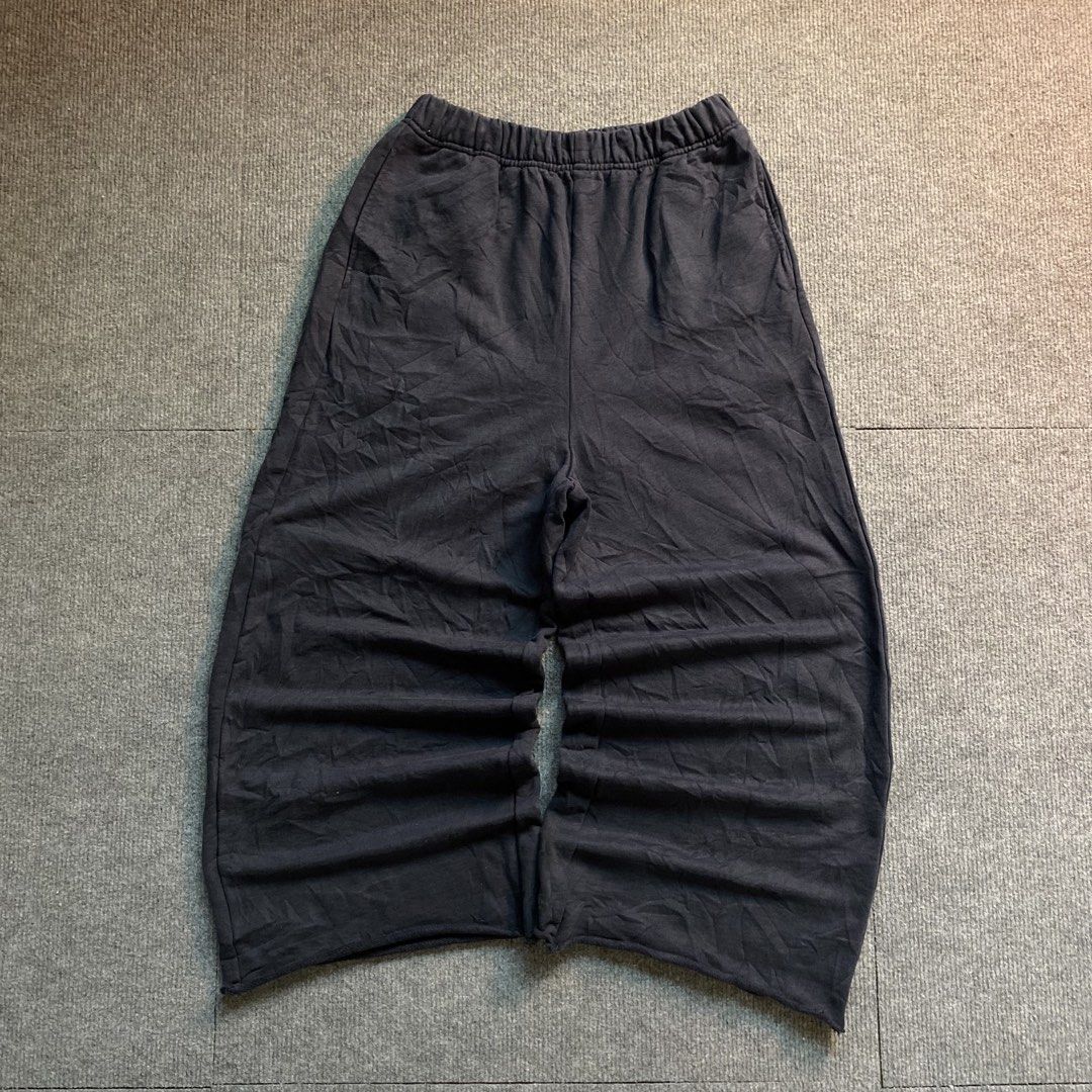Dark Grey Wide Leg Sweatpants Drawstring Waist (Category: Joggers) located in Malaybalay. Submitted by mat.loots (Listing ID 1466087662, Image 1). Description: - Color: Dark grey - Fit: Super relaxed with extra wide legs - Waistband: Secure elastic waist - Details: Raw hem at the bottoms, no brand tags visible - Material: Soft cotton blend - Perfect for: Lounging around or running errands.