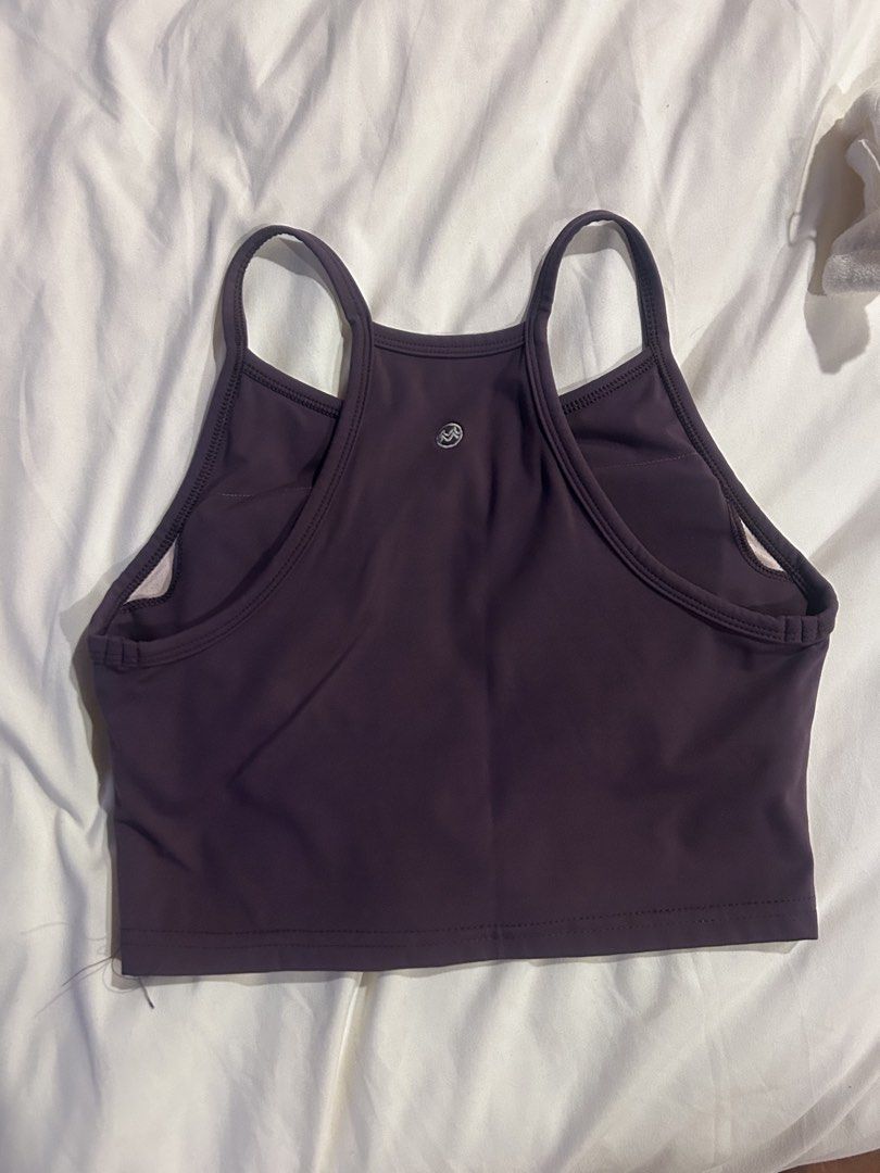 Dark Purple Athletic Crop Top with Racerback (Category: Activewear) located in Cebu City. Submitted by shopmikascloset (Listing ID 1466051548, Image 2). Description: - Color: Dark purple - Style: High neckline crop top with thin straps and racerback cut - Features: Padded - Material: Soft, smooth, and stretchy athletic fabric - Ideal for: Gym sessions, yoga, and training routines - Condition: Lightly used and comfortable.